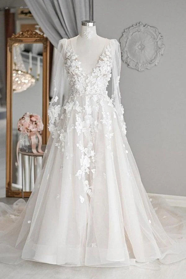 Women's Casual Apparel For Weekends Chic Trends For The Fashion Savvy Elegant A-line V-neck long sleeved ivory sheer and floor length wedding dress